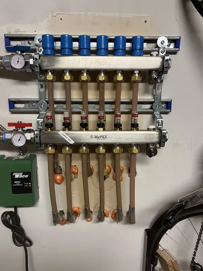 Plumber performing Water Heater Repair at a residential property in Cloverleaf